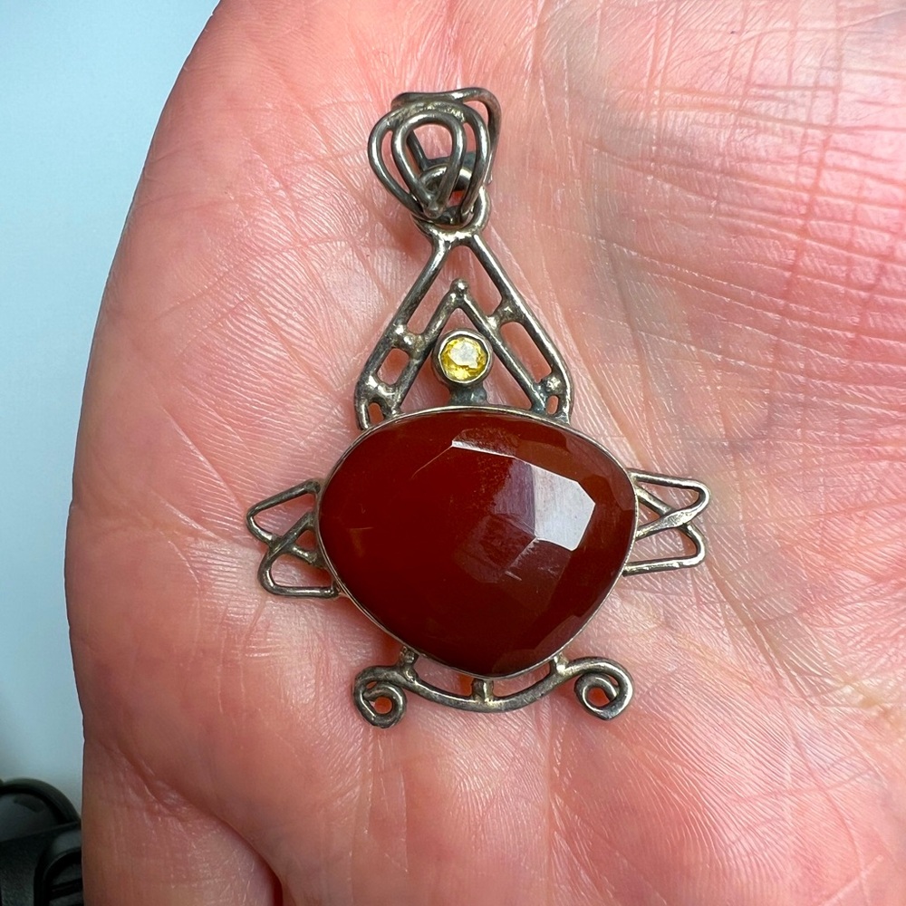 Sterling Silver Carnelian Pendant with Yellow Accent